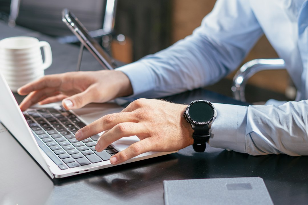Person using a laptop to review job and skill-training options