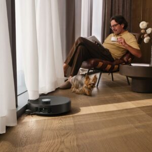 Illustrative lifestyle image showing a household robot vacuum; not the MOVA E20S Pro product